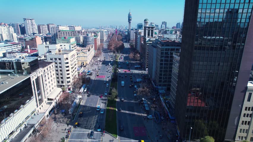 Santiago Skyline At Santiago Santiago Chile. Aerial View Of A Bustling City With High-Rise Buildings And Traffic. Town Clouds Sky Backgrounds Urban. Outdoors Backgrounds Panorama. Santiago Chile.