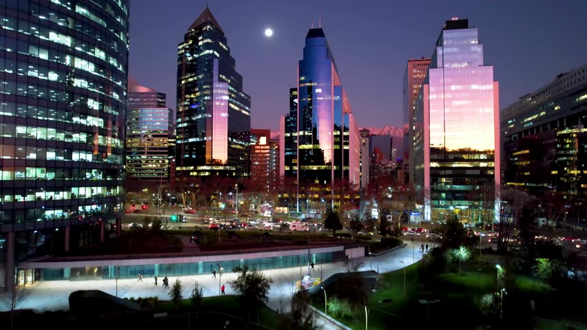 Santiago Skyline At Santiago Santiago Chile. Modern City Center With Skyscrapers Reflecting The Urban Life. Sunset Clouds Sky Downtown Cityscape. Sunset Downtown Illumination. Santiago Chile.