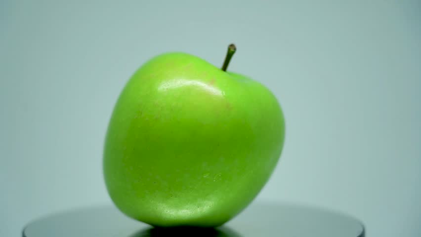 Green Apple or Granny Smith Apple turn around on grey background