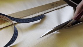 Cutting the Thick Fabric with Scissors in The Tailor Workshop Art - Powered by Shutterstock - Get 15% off with code: PIKWIZARD15