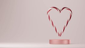 A heart made of candy canes is suspended in the air over podium. The candy canes red-white color floating and rotation on pastel pink background. 3d animation. - Powered by Shutterstock - Get 15% off with code: PIKWIZARD15