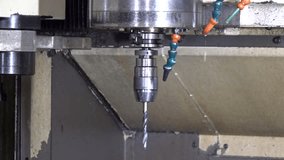 Close up view of automatic cnc drill or lathe machine changing drilling bit process in a factory. - Powered by Shutterstock - Get 15% off with code: PIKWIZARD15