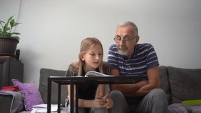 
Grandfather and grandson study together at home. The elderly man patiently helps the boy with schoolwork, creating a warm and supportive learning moment. - Powered by Shutterstock - Get 15% off with code: PIKWIZARD15