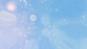 Ethereal Light Bubble Animation with Soft Blue and Pastel Hues Floating in a Dreamy Background - Powered by Shutterstock - Get 15% off with code: PIKWIZARD15