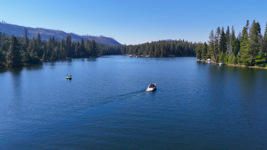 Drone flyover of a boat in Shaver Lake California.