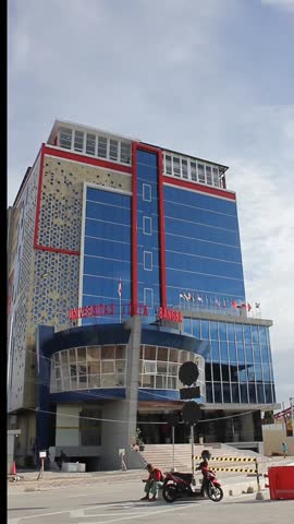 Indonesia, Solo - December 27, 2024: the building of the Duta Bangsa University with a blue sky background,located Nusukan,banjarsari