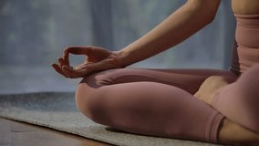 Close-up of woman's hands while meditating indoors. - Powered by Shutterstock - Get 15% off with code: PIKWIZARD15