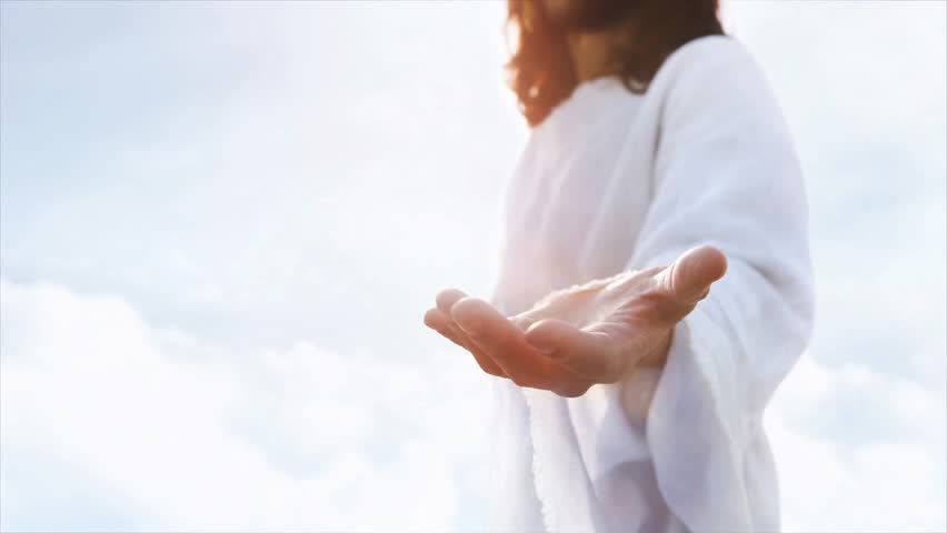 Jesus reaching out his arms from heaven to save us, the resurrected Jesus Christ leading us to heaven, the cross and love and Easter background
