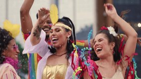 Smiling Friends Throwing Confetti at a Brazilian Carnival Celebration. Joyful Group Dressed in Colorful Costumes Enjoying Vibrant Carnaval Festivities Outdoors - Powered by Shutterstock - Get 15% off with code: PIKWIZARD15