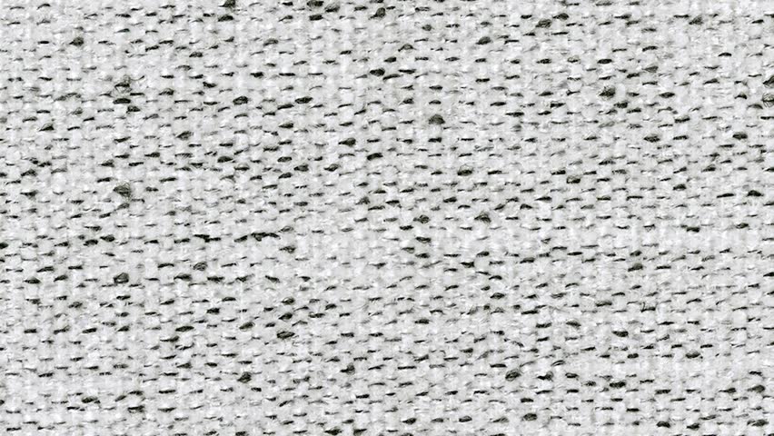Macro Pan Across White and Black Stitched Upholstery Material