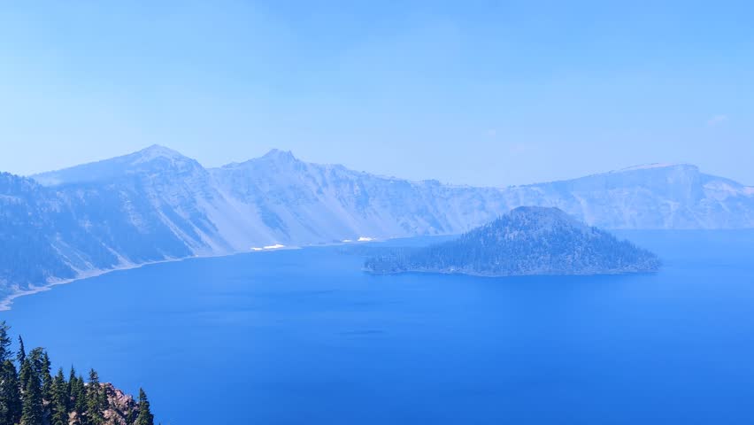Closeup Pan Across Smoke Covered Crater Lake