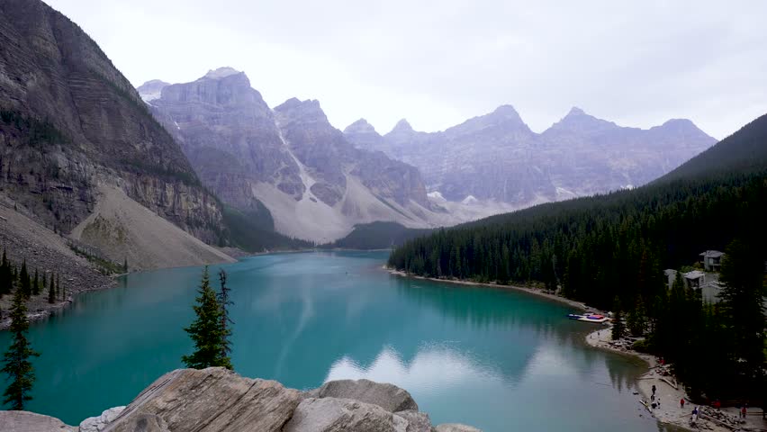 Peaceful Moraine Lake in Banff, Canada with Turquoise Waters and a View of Majestic Alpine Scenery, High Angle