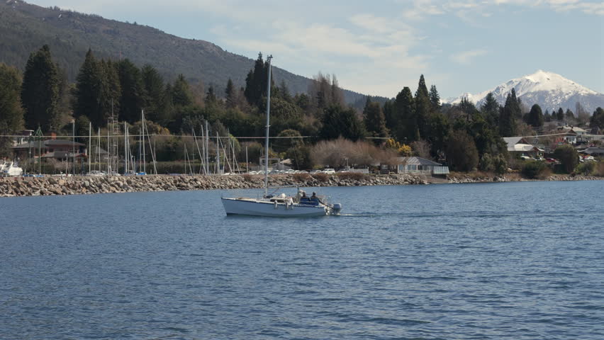 Sailboat on Lake Nahuel Huapi with Snow-Capped Andes in San Carlos de Bariloche, Argentina