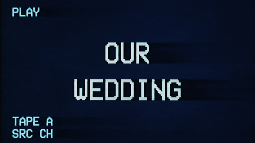 Real VHS recording playback shows Our Wedding title appearing on screen with authentic analog distortion, static, and tracking lines. Classic 1980s home video aesthetic, raw nostalgia.