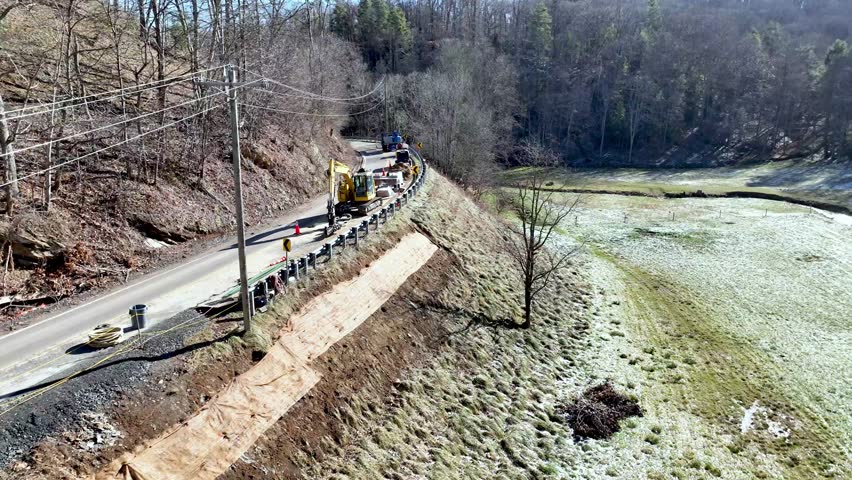 ROAD REPAIR AFTER HURRICANE HELENE STRIKES NC MOUNTAINS NEAR BOONE NC, NORTH CAROLINA