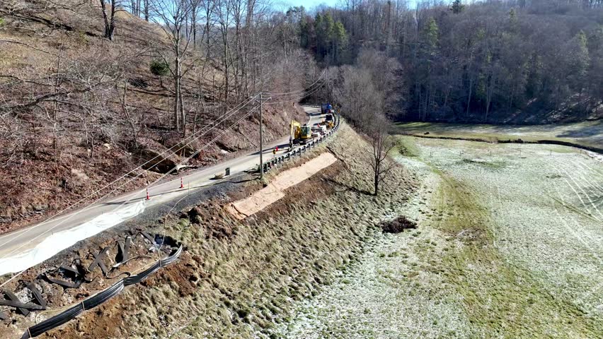 Hurricane Helene Road Building Ashe County NC along highway 67