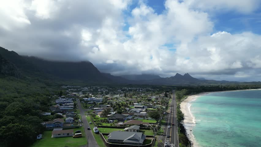 Amazing aerial view of a beautiful white sand beach and turquoise water in Hawaii