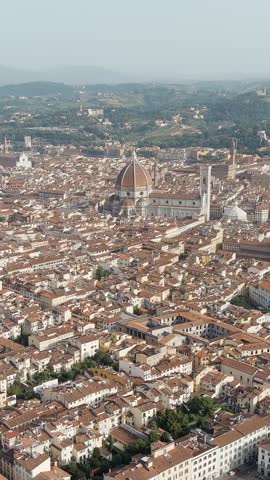 Vertical video. Florence, Italy. Cathedral Santa Maria del Fiore. Panoramic view of the city. Summer. Evening, Aerial View, Point of interest