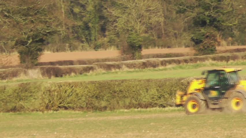 Tractor Driving Across A Field