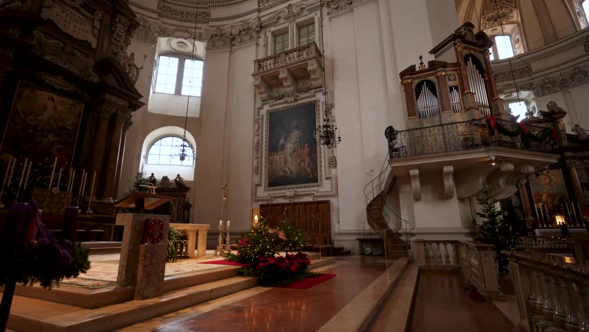 Salzburg, Austria - December 23, 2024: The Pulpit in Salzburg Cathedral: A Historic and Ornate Symbol of Faith, Architecture, and Sacred Atmosphere. Slide transition.