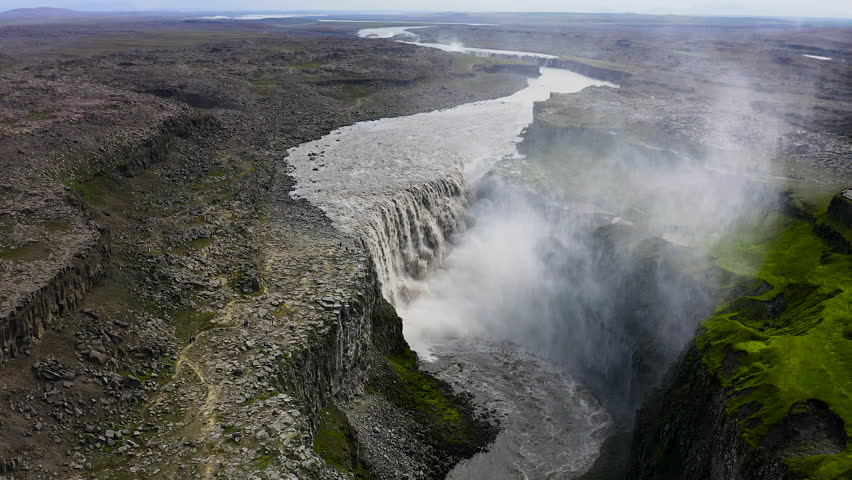 Aerial view of the impressive Dettifoss  waterfall, located along the river Jokulsa, falls from a height of 44 metres over a width of 100 metres.