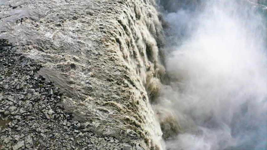 Aerial view of the impressive Dettifoss  waterfall, located along the river Jokulsa, falls from a height of 44 metres over a width of 100 metres.