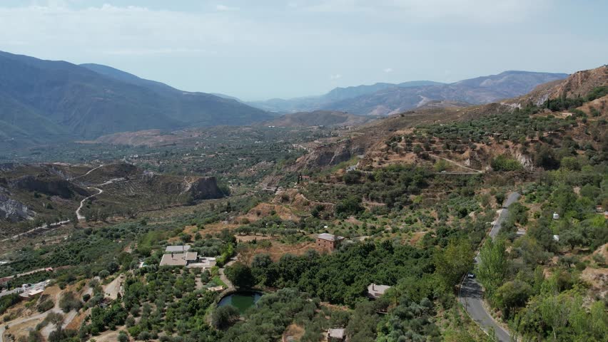 4K drone footage of La Alpujarra zone under Sierra Nevada mountains in Andalucia Spain.