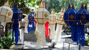 Traditional lanterns made of paper and cotton hang around the temple, representing ancient decorative styles in northern Thailand. - Powered by Shutterstock - Get 15% off with code: PIKWIZARD15