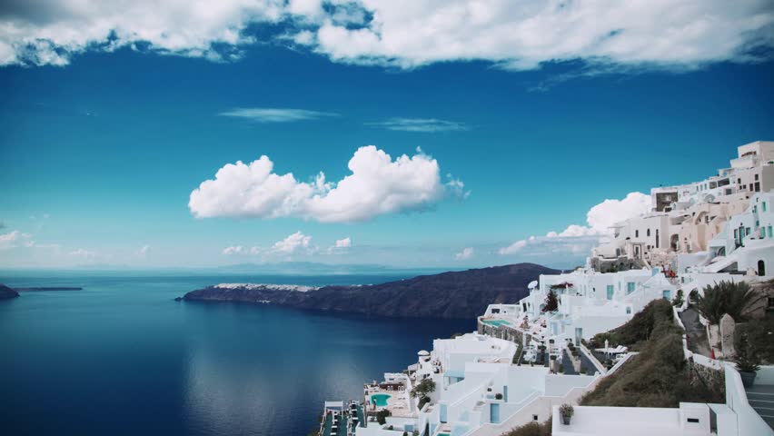 Picturesque Coastal Scene with White Buildings and Blue Sea