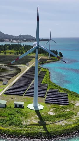 Wind Farm At Victoria Mahe Island Seychelles. Wind Turbines Generate Clean Energy On A Tropical Coast. Coast Sky Clouds Seaside Summertime. International Seaside Panning Wide. Victoria Mahe Island.