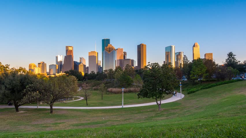Houston Downtown modern business city with skyscraper city scape with park view from Buffalo Bayou center of Houston city, Texas, United States of America, US at sunset time