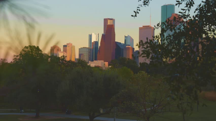 Houston Downtown modern business city with skyscraper city scape with park view from Buffalo Bayou center of Houston city, Texas, United States of America, US at sunset time