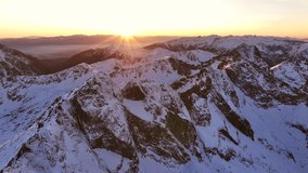 Majestic sunrise over snow-covered mountains in winter landscape - Powered by Shutterstock - Get 15% off with code: PIKWIZARD15