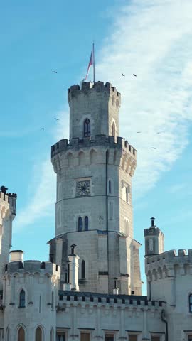 Majestic Castle Tower Standing Tall Under a Clear Blue Sky, Hluboka nad Vltavou