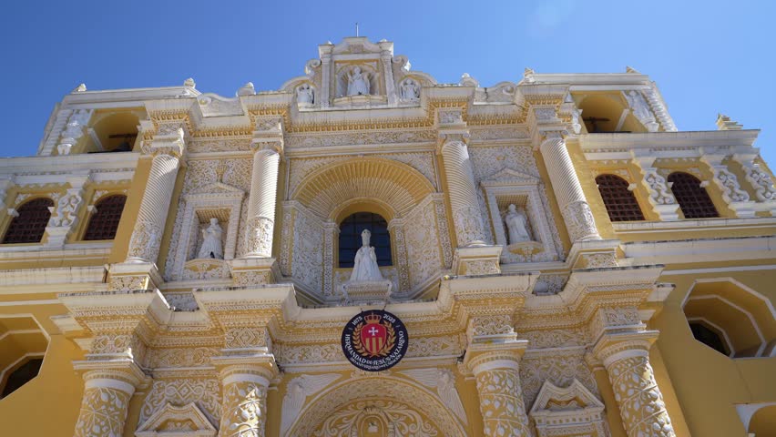 Detailed view of La Merced Church in Antigua Guatemala, showcasing its Baroque architecture, ornate carvings and colonial-era charm.