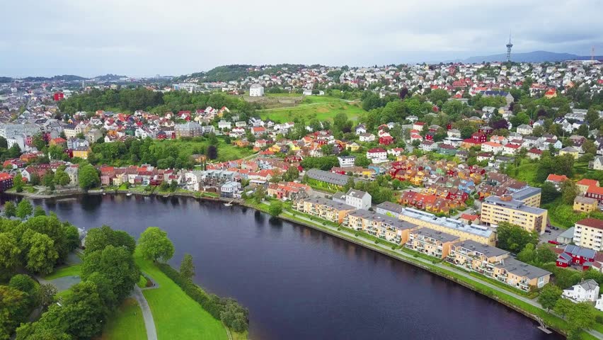 Nidelva river and Trondheim city aerial panoramic view. Trondheim is the third most populous municipality in Norway.