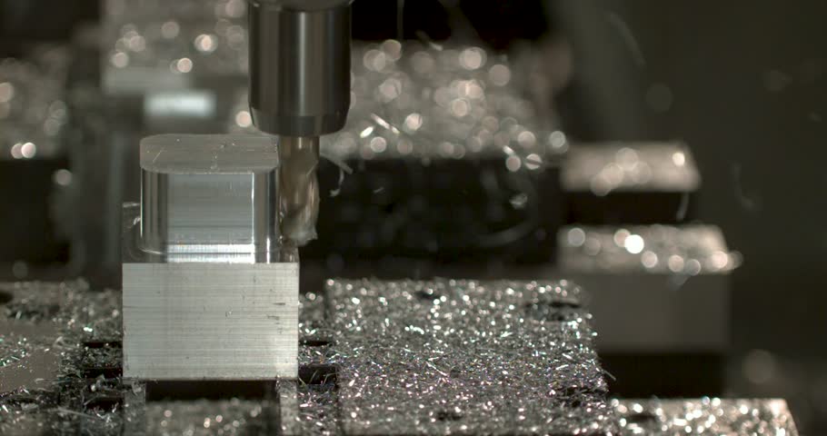 cnc machine super slow motion cinematic beautiful metal flying