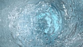 Super Slow Motion Shot of Water Whirling in Glass Bottle at 1000fps. - Powered by Shutterstock - Get 15% off with code: PIKWIZARD15