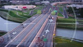 Cars drive along a highway in the USA, digital overlay displays traffic patterns and data, showcasing advanced monitoring and analysis of transportation flow - Powered by Shutterstock - Get 15% off with code: PIKWIZARD15