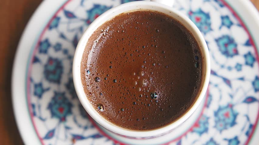 a cup of turkish coffee on table 