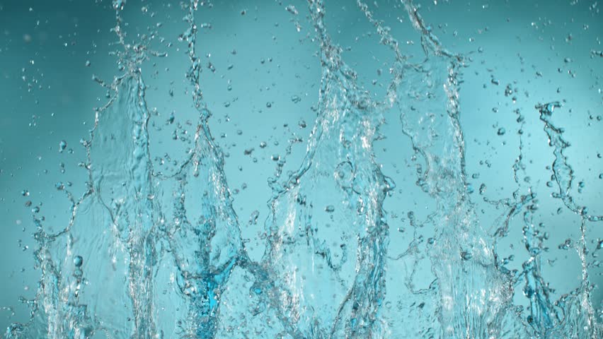 Slow motion of splashing water on light blue background , filmed on high speed cinematic camera at 1000 FPS