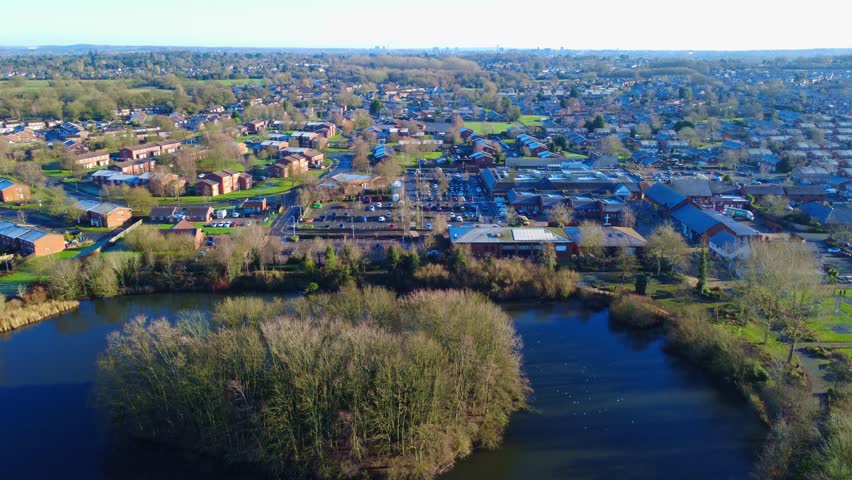 Rising reveal showing the village of Perton in South Staffordshire, UK