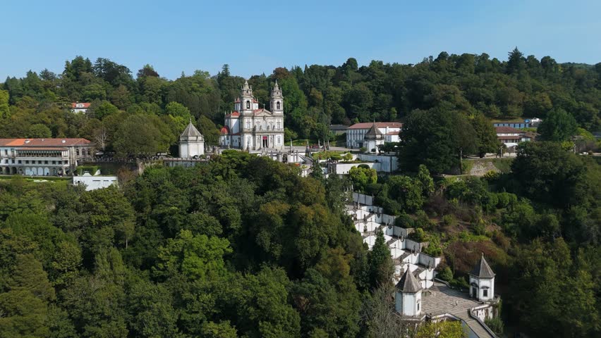 Sanctuary of Bom Jesus do Monte on Hill on Sunny Day. Braga, Portugal. Aerial View. Orbiting
