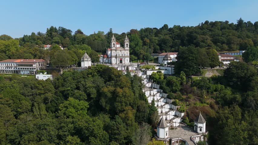 Sanctuary of Bom Jesus do Monte on Hill on Sunny Day. Braga, Portugal. Aerial View. Orbiting