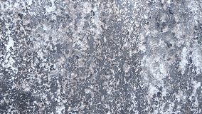 Weathered grey and black concrete wall texture with flaking paint close up slowly zooming in. Abstract industrial texture background, overlay or design element. Abstract industrial texture background, - Powered by Shutterstock - Get 15% off with code: PIKWIZARD15
