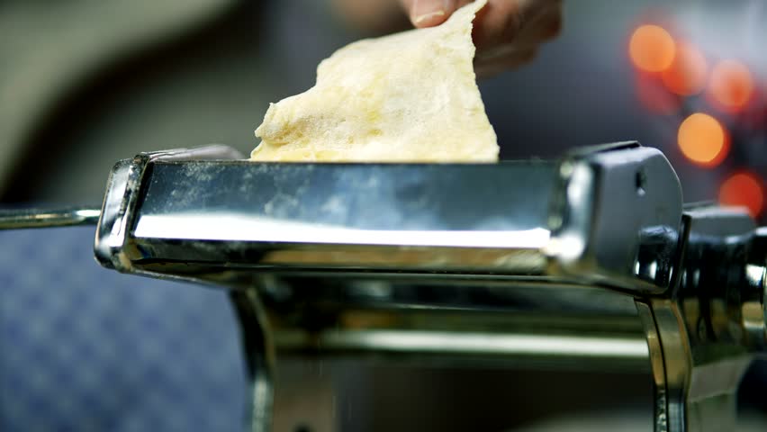 Fresh Pasta Machine Italian Food. Prepare Spaghetti And Linguine. Cooking Traditional Italian Homemade Pasta. Italian Cuisine. Make Spaghetti Or Fettuccine. Fresh Pasta Dough. Italian Food Pasta Dish