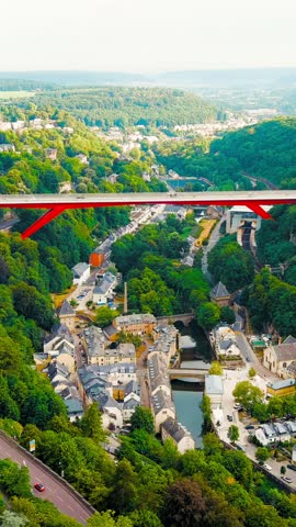 Vertical video. Luxembourg City, Luxembourg. Pont Rouge. Panoramic view of the historical part of Luxembourg. City is located in valley of two rivers - Alzette and Petrus, Aerial View. Rich colors