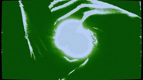 4k Loop Retro Tv Exploration of Glowing Orb Hand Reaching Towards Light in Green Background, Abstract Retro Tv Digital Art Connection to Technology and Visual Curiosity  - Powered by Shutterstock - Get 15% off with code: PIKWIZARD15