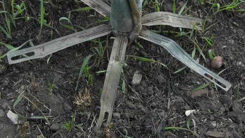 An anti-personnel mine was triggered on the ground. A mine that exploded. Real hostilities. Weapons during the Russian-Ukrainian war.