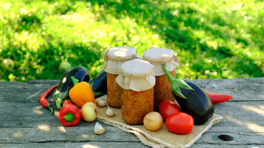 Preserving eggplants in a jar. Selective focus.